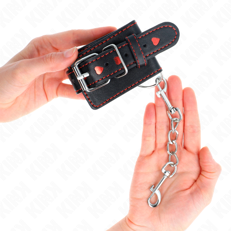 KINK - APPUI-POIGNETS NOIR AVEC INCRUSTATION COEUR ROUGE RÉGLABLE 21-28 CM X 5,5 CM - 7eme ciel