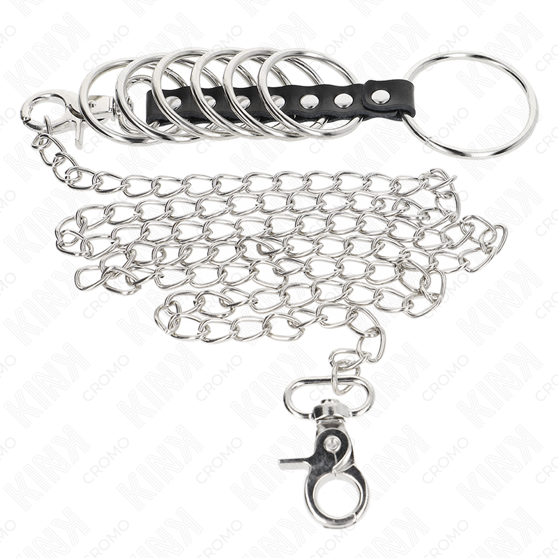 KINK - 7 ANNEAUX PÉNIS EN MÉTAL DE 3,8 CM À 5 CM CONNECTÉS AVEC DU CUIR ET UNE CHAÎNE EN MÉTAL 100 CM - 7eme ciel